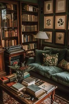 a living room filled with lots of books and furniture