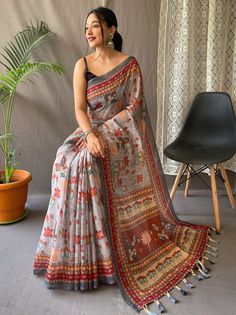 Charm your way through any gathering with the elegant and splendid Perfect Ash-Grey Kalamkari Print Cotton Occasion Saree with Blouse. Crafted from smooth and pure malai cotton, this saree is designed with intricate kalamkari prints, giving your traditional look a stylish twist. The ash-grey palette of this saree is truly stunning and is complemented with a contrasting pallu and cute tassels, tying the entire ensemble together beautifully.
Measuring 5.50 meters, this saree provides ample fabric Kalamkari Prints, Kalamkari Print, Grey Saree, Kalamkari Saree, Printed Saree, Traditional Attire, Silk Sarees Online, Cotton Sarees, Traditional Fashion