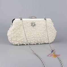 Material: synthetic leatherLining material: polyesterLuggage shape: dumpling typePopular elements: beadingColor: white, apricot Pearl Handbag, Beaded Evening Bags, Wedding Clutch, Pearl Wedding, Fabric Texture, Cheongsam, Leather Fabric, Clutch Purse, Pearl Beads