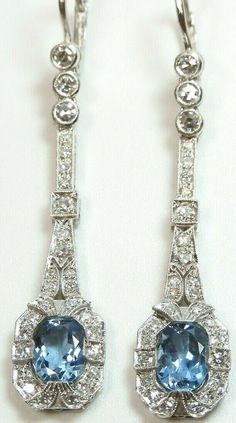 ART DECO SANTA MARIA NATURAL AQUAMARINE + DIAMOND EARRINGS (See Video Below) {International Buyers Are Responsible For Customs & Duty Fees} Circa ~ 1930'S 2 ~ Natural Aquamarines Shape ~ Oval Color ~ Medium - Dark Blue 1 ~ 8.12 MM x 6.10 MM x 3.91 MM (1.11 Carat) 1 ~ 8.02 MM x 6.10 MM x 3.65 MM (1.07 Carat Size ~ 2.18 Carat Total Weight Country Of Origin ~ Brazil (Santa Maria Mines) 56 ~ Round Single Cut Natural Diamonds Total Weight ~ 1.10 Carat Color ~ F - G Clarity ~ VS 1 - VS 2 Overall Lengt Classic Blue Platinum Earrings, Formal Hallmarked Platinum Earrings, Platinum Hallmarked Earrings For Anniversary, Platinum Hallmarked Anniversary Earrings, Formal Oval Art Deco Earrings, Oval Art Deco Earrings For Formal Occasions, Art Deco Formal Earrings Hallmarked, Art Deco Oval Earrings For Formal Occasions, Silver Art Deco Platinum Diamond Earrings