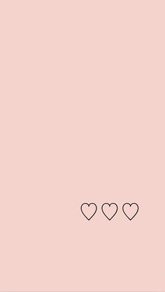 three hearts on a pink background with the word love spelled in black font above them