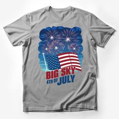 Celebrate the 4th of July in style with this eye-catching Big Sky patriotic tee! Featuring a vibrant display of fireworks behind the American flag with bold Big Sky 4th of July lettering, this shirt is perfect for Independence Day parades, barbecues, and fireworks shows. Made with soft, comfortable material and available in a range of sizes, this unisex t-shirt is not only a festive addition to your holiday wardrobe but also a great way to show your American pride. Get ready to light up your 4th Patriotic American Flag T-shirt For Summer, Patriotic Pre-shrunk Shirt For 4th Of July, Independence Day Graphic Tee Made In Usa, Patriotic American Flag Print T-shirt For 4th Of July, Patriotic American Flag Shirt For 4th Of July, Patriotic T-shirt With American Flag For 4th Of July, 4th Of July T-shirt With American Flag Print, Patriotic Flag Print Shirt For 4th Of July, 4th Of July American Flag Print Short Sleeve T-shirt