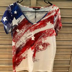 Nwt- C.O.Z.Y Abstract American Flag T-Shirt. Never Worn, Great Condition!! Size Medium. Summer V-neck T-shirt With American Flag Print, Patriotic V-neck Summer Tops, Cotton V-neck Top With American Flag Print, White T-shirt With American Flag Print For Spring, Red Tops With American Flag Print For Spring, Casual Red T-shirt With American Flag Print, American Flag Print V-neck Tops For Summer, Summer V-neck Tops With American Flag Print, Red V-neck Shirt With Graphic Print