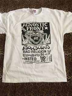 Agnostic Front Flyer T-Shirt. Art Taken from a flyer for their show at Fenders Ballroom in Long Beach California in 1988.Reproduced with kind permission from the artist who designed the flyer,Andrew Wendel. Hand Screened on 100% Cotton T-Shirt Vintage Flyer, Long Beach California, T Shirt Art, Beach California, Mens T Shirts, Long Beach, Grunge Outfits, Ballroom, Cotton T Shirt