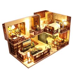 an overhead view of a living room and dining area in a model house with furniture