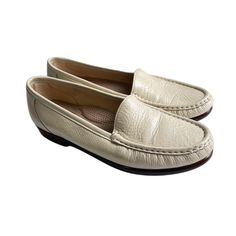 Shoes Appear Unused. No Flaws Noted. Classic Almond Toe Slip-ons For Everyday, Classic Beige Slip-ons For Office, Classic White Slip-ons With Flat Heel, Classic Cream Slip-on Moccasins, Casual Cream Leather Shoes With Round Toe, Beige Slip-on Moccasins With Round Toe, Beige Closed Toe Moccasins With Leather Sole, Beige Leather Sole Moccasins Closed Toe, Classic Leather Sole Loafers For Everyday