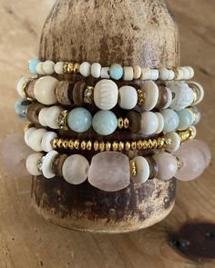 ✨💛 peaceful beachy stack✨ pale pinks, rustic browns, cool blues and pops of gold in this 5 piece bead stack.  peaceful and calming color combo for our fast paced hectic world.  pairs with other rhinestone cuffs so nicely. listing is for the 5 beaded bracelets shown, the cross and rhinestone cuffs are sold separately in my shop, for dislplay purposes only. message with questions shipping is ground tracked insured Beaded Bracelets Pink, Stretch Beaded Bracelets, Beaded Bracelet Stack, Boho Bracelets Stack, Bracelets Stack, Bracelets Pink, Glass Beaded Bracelet, Beach Boho, Bohemian Beach