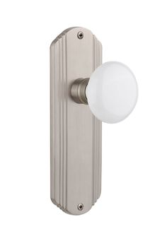 a light that is on the side of a wall mounted fixture with a white glass ball