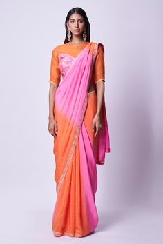 Orange and pink ombre base saree featuring sequin butti detail and zari embroidered border. Comes with zari embroidered padded blouse. - Aza Fashions Pink Cotton Silk Pre-draped Saree For Reception, Designer Fusion Pre-draped Saree With Zari Work, Fusion Style Pink Dupatta For Diwali, Pink Fusion Dupatta For Diwali, Pink Fusion Style Dupatta For Diwali, Fusion Style Pre-draped Saree With Zari Work For Navratri, Fusion Style Pre-draped Saree With Zari Work For Diwali, Orange Saree, Orange Blouse