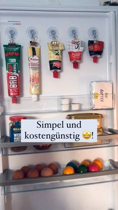 an open refrigerator filled with lots of different types of food and condiments on the shelves