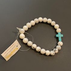 Brand New Never Worn In Perfect Condition. Stretchy Bracelet With Beads. Comes With Travel Pouch. White Spiritual Bracelets With Colorful Beads, Spiritual White Bracelets With Colorful Beads, Casual White Stretch Bracelet With Gemstone Beads, White Casual Beaded Bracelets With Gemstone Beads, Casual White Beaded Bracelet With Gemstone Beads, Casual White Beaded Bracelets With Gemstone, White Adjustable Crystal Bracelet Casual Style, Casual Adjustable White Crystal Bracelet, Casual White Gemstone Beaded Bracelets