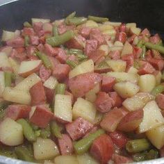 the food is prepared and ready to be cooked in the pot on the stove top