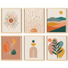 four framed art prints featuring mountains, trees and sunbursts in various colors