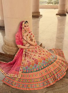 Pink Multicoloured Traditional Embroidered Lehenga Choli Shop Designer Lehengas In USA UK Canada With Free International Shipping. features designer ensemble with the touch of ethnic motif embroidery on printed art silk blouse highlighted with crystal stone, zari and thread work paired with equally all over embellished art silk lehenga with 3d print and embroidery detail soft net dupatta. Style this very pretty attire with heels and gold jewellery on this wedding season to look stunningly beauti Printed Lehenga, Latest Bridal Lehenga, Beige And Pink, Net Blouses, Choli Designs, Beige Art, Embroidered Lehenga, Bridal Lehenga Choli, Lehenga Saree