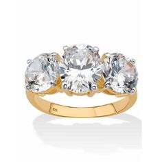 You'll make a sparkling entrance wherever you go when sporting this voluminous anniversary ring. The oval-cut cubic zirconia center stone is adorned with a sparkling round cubic zirconia accent stone on either side. This bold sparkler boasts 6.54 carats T.W. Great right-hand ring! 18k gold-plated or platinum-plated sterling silver. (All carat weights are approximate and may vary slightly from those listed.) 51159RNG Size: 5.  Color: White.  Gender: female.  Age Group: adult. Matching Wedding Band Sets, Rose Gold Halo, Bridal Engagement Rings, Right Hand Rings, Gold Halo, Wedding Band Sets, Cubic Zirconia Rings, Rings Cool, Gold Plated Rings