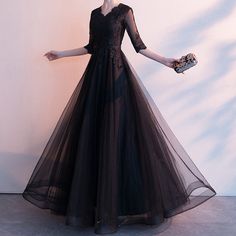 Black Simple Long Formal Gown (Stunning) Black V-neck Gown For Banquet, Black Floor-length Prom Dress, Elegant V-neck Ball Gown For Formal Occasions, Black Long Sleeve Gown For Prom Season, Black Long Sleeve Gown For Prom, Black Gown For Banquet During Prom Season, Black V-neck Evening Dress With Sweep Train, Black V-neck Gown With Sweep Train, Full Length Black Dress For Banquet