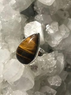 Tiger's Eye Ring – Tropica Exotica, LLC Tigers Eye Crystal, Tigers Eye Gem, Eye Drop, Large Stone Rings, Alt Goth, Pear Shaped Ring, Tiger Eye Jewelry, Tiger Eye Crystal, Anniversary Ideas