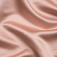 There’s nothing to blush about when it comes to this Blush Premium Polyester Satin! Featuring a medium weight, sleek hand, and fluid drape, it’s the perfect choice for eye-catching evening wear.Suggested Projects:  Dresses, Skirts, Blouses, ShirtsContent:  100% PolyesterStretch:  NoneOpacity:  OpaqueImagine bridesmaid dresses, mother-of-the-bride gowns, and more with this blush pink satin! A sleek hand, lustrous face, and fluid drape combine to deliver affordable elegance to your wardrobe. This Pink Silk Fabric For Wedding, Elegant Pink Tissue Silk Embroidered Fabric, Dusty Pink Fabric, Satin Fabric Swatch, Rose Gold Fabric, Pink Satin Fabric, Gowns Short, Rose Gold Satin, Mood Designer Fabrics