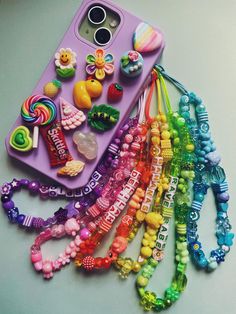 🌈Funky beaded phone candy charms... fab to add a little pop of colour & a little extra safety to holding your phone  🍬Available in Mini (approx 5" long - 10" loop) Medium (approx 6.5" long - 13" loop) & Large 8" long - 16" loop) 🍦Choose from Purple 💜 Hot Pink 💖 Baby Pink 💗 Orange 🧡 Yellow 💛 Green 💚 or Blue 💙 🍭Or mix it up and choose however many colours of your choice... Baby Pink & Green, Hot Pink & Orange, Purple & Blue Just choose 'Custom Colours' & pop your choices in the personal Bracelets Kandi, Quick Braids, Charm Phone, Easy Paper Crafts Diy, Pink Orange Yellow, Rose Orange, Phone Strap, Letter Beads, Easy Paper Crafts