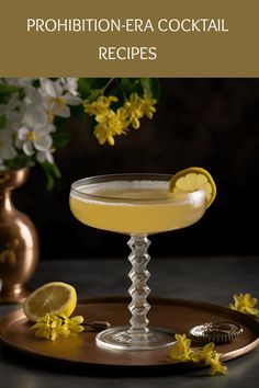 a glass filled with lemonade and garnish on top of a wooden tray