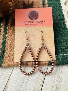 New without tags* ETHNIC REGIONAL STYLE : Native American * JEWELRY TYPE : Earrings * TYPE : Beads * FEATURED REFINEMENTS : Navajo Earrings * MATERIAL : Stone * METAL : Copper * TRIBAL AFFILIATION : Navajo * MAIN STONE : No Stone Navajo Copper beaded dangle hoop earrings. Such a great pair for any collection! These beauties measure 2 3/4 inches long and 7/8 of an inch wide. May vary.     Thank you for checking out our items. Please contact us if you have any questions.  9/14/24    Exported By ExportYourStore :) SKU:489830900041_480A* Comfy Fall Sweaters, Navajo Earrings, Engagement Presents, Bridesmaid Gift Boxes, Travel Jewelry Box, Mixed Metal Jewelry, Dangle Hoop Earrings, Personalized Gifts For Her, Square Earrings