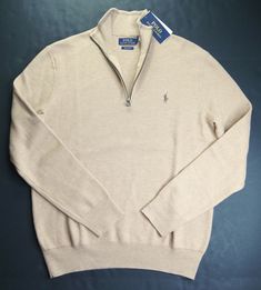 POLO RALPH LAUREN  Camel Melange Pima Cotton 1/4 Zip Pullover Sweaters Description:  Details  Made in China Trim Fit Mock neck Quarter-zip placket Long sleeves with rib-knit cuffs Rib-knit hem Measurements Note: All measurements are taken by hand manually. So please note that it might differ +/- 0.5" Size S: Chest (pit to pit) 20" ; Length (shoulder to hem) 26" Size M: Chest (pit to pit) 21" ; Length (shoulder to hem) 27" Size 2XL: Chest (pit to pit) 26" ; Length (shoulder to hem) 30"Customer's Ralph Lauren Zip, Trim Fit, Signet Rings, Streetwear Men, 1/4 Zip Pullover, Streetwear Men Outfits, Polo Ralph Lauren Mens, 1/4 Zip, Pima Cotton