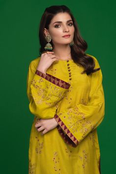 Dhanak (Three Piece)– Zaaviay Traditional Green Blouse For Eid, Traditional Eid Blouse With Printed Motifs, Festive Eid Tops With Printed Motifs, Designer Yellow Blouse For Eid, Traditional Blouse With Printed Motifs For Eid, Festive Blouse With Printed Motifs For Eid, Yellow Raw Silk Kurta With Dabka, Yellow Dabka Raw Silk Kurta, Long Sleeve Lawn Suit In Yellow With Naqshi Detailing