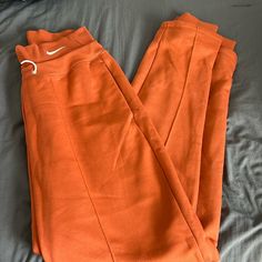 Nike Sweatpants Size: Medium Never Worn. I Love These Sweats! Sadly They Just Are Way Too Big/Long For Me. I’m 5’3 And They Bunch Up Bad At The Bottom. Would Fit Someone Taller. My Loss Your Gain Burnt Orange Nike Sweatpants, Nike Stretch Pants For Loungewear, Nike Solid Color Loungewear Pants, Nike Loungewear Trousers, Nike Solid Color Loungewear Bottoms, Nike Sweatpants For Loungewear, Nike Stretch Bottoms For Loungewear, Nike Jogger Trousers For Loungewear, Nike Stretch Cotton Pants