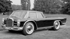 an old black and white photo of a car