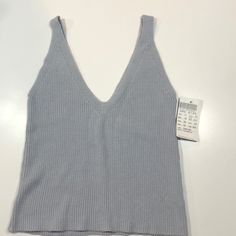 Nwt. Brandy Melville Sweater Tank. Grey/Blue Color V On Front And Back. 100% Cotton One Size. Really Cute. Smoke Free Home Trendy Seamless Winter Tops, Trendy Seamless Tops For Winter, Casual Seamless Winter Top, Casual Knit V-neck Crop Top, Casual V-neck Knit Crop Top, Casual Seamless Knit Tops, Seamless Casual Tops For Fall, Seamless V-neck Tops For Day Out, Brandie Melville