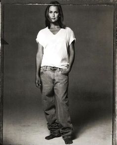 black and white photograph of a woman in jeans