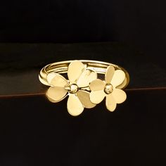 Ross-Simons - Italian 14kt Yellow Gold Flower Ring Size 5. Crafted in Italy, two beautiful blooms glisten in polished 14kt yellow gold. This ring is the perfect feminine touch to an everyday look. 3/8" wide. 14kt yellow gold flower ring. Gold Flower Ring, Size 10 Rings, Flower Ring, Beautiful Blooms, Everyday Look, Ring Size, Yellow Gold, Yellow, Flowers