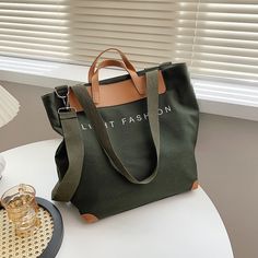 Brand Name: MR.YLLSShape: Casual TotePlace Of Origin: HE BEI ?ProvinceHandbags Type: Shoulder BagsTypes of bags: Shoulder & HandbagsOrigin: CN(Origin)Main Material: CanvasClosure Type: zipperHardness: SOFTExterior: NoneStyle: CasualLining Material: NoneOccasion: VersatileGender: WOMENPattern Type: SolidNumber of Handles/Straps: SingleInterior: Interior Slot PocketInterior: Cell Phone PocketDecoration: NoneItem Type: HandbagsColor: black women bag,beige women bagbag 1: luxury handbags women bags Leather Patchwork, Handbags Designer, Canvas Messenger Bag, Canvas Handbags, Casual Tote, Canvas Shoulder Bag, Shoulder Tote Bag, Large Bag, Shopper Bag