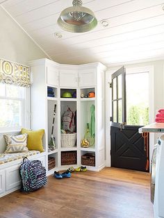 an image of a room with white walls and wood flooring on the bottom right hand corner