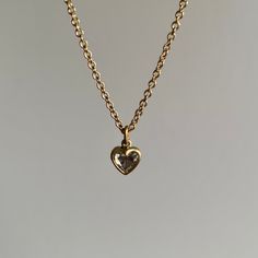 A subtle, resolute diamond heart to keep close to your own. 18k yellow gold Diamond, 0.54ct SII, 5mm x 4mm (1/4" x 3/16")Chain is 18" long Gold Diamond Heart Necklace With Heart Charm, Gold Diamond Necklace With Open Heart Charm, Classic Gold Diamond Necklace With Heart Charm, Heart Shaped Yellow Gold Necklace With Single Cut Diamonds, Dainty Heart-shaped Gold Diamond Necklace, Dainty Gold Heart Diamond Necklace, Classic Gold Heart Cut Diamond Necklace, Classic Yellow Gold Diamond Necklace With Heart Charm, Gold Heart-shaped Brilliant Cut Diamond Necklace