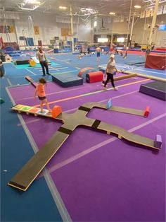 children playing in an indoor trampoline gym