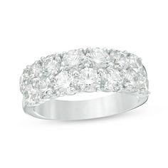 a white gold ring with five rows of round cut diamonds on the sides and two rows of smaller stones in the middle