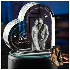 a personalized crystal heart with an image of a man and woman