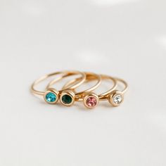 This listing is for a beautiful birthstone ring, crafted from high-quality metal and gemstone that represents the wearer's birth month. Each birthstone is associated with specific qualities, making this ring a meaningful and personal accessory. The ring features a simple yet elegant design that showcases the gemstone. Whether worn as a daily reminder of one's special qualities, or given as a sentimental gift, this birthstone ring is a timeless and cherished accessory. Choose your birth month and Dainty Crystal Ring With Birthstone For Promise, Dainty Crystal Birthstone Ring For Promise, Dainty Birthstone Rings For Anniversary, Dainty Birthstone Crystal Ring, Gold Crystal Birthstone Ring For Gift, Rose Gold Jewelry With Birthstone In Round Band, Rose Gold Round Band Jewelry With Birthstone, Rose Gold Jewelry With Birthstone, Dainty Crystal Birthstone Ring As Gift