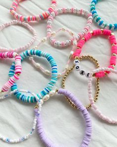 Welcome to ShopShimmerandShine! I'm a teen who makes accessories that are: ♡ cute ♡ handmade ♡ affordable  ✨ These new trendy bracelets add the perfect pop of colour! They are made with heishi clay beads and a stretchy while sturdy elastic. ✨  SIZING: Each bracelet measures around 6.5 inches which fits great for most teens and adults. However please contact me if you would like a custom length! Also, try to keep bracelets dry. 💌 FREE SHIPPING! - Through Canada Post Oversized Lettermail Feel fre Trendy Heishi Beads Friendship Bracelets As Gift, Trendy Heishi Beaded Bracelets As Gift, Trendy Heishi Beads Bracelet For Gift, Trendy Heishi Beads Bracelet As Gift, Playful Blue Friendship Bracelets With Colorful Beads, Fun Blue Beaded Friendship Bracelets, Handmade Blue Friendship Bracelets Playful Style, Summer Friendship Bracelets With Heart Beads As Gift, Blue Handmade Friendship Bracelets Playful Style