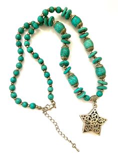 Turquoise beaded necklace with star shaped pendant amulet Meausres approximately 20 in. long. Bohemian Star Beaded Necklaces For Jewelry Making, Bohemian Star-shaped Beaded Necklaces, Bohemian Star-shaped Beaded Necklace, Festival Beaded Star Necklaces, Star-shaped Beaded Necklace For Festival, Festival Star-shaped Beaded Necklace, Bohemian Festival Necklaces With Star Charm, Bohemian Necklace With Star Charm For Festivals, Bohemian Star Charm Necklace For Festivals