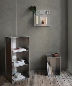 a book shelf sitting on top of a wooden floor