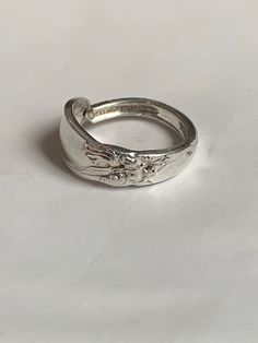 Handcrafted from a Community silver plate spoon, this floral delight is suitable for everyday and all occasions. Custom made for you in ring sizes 7 1/2 to 12. Please state ring size when ordering. Orchid Ring, Wax Seal Ring, Spoon Ring, Spoon Rings, White Orchids, Ring Sizes, Jewelry Inspo, Dream Jewelry, Metal Working