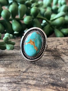 Here we have a beautiful sterling silver ring with turquoise. This item was made by MP. The ring size is 7.0.  Type: Ring  Metal: Silver   Purity: Sterling (.925)  Weight: 8.7 Grams  Measurements (Face MM): 24.70 x 19.12  Stone/s: Turquoise  Maker: MP  Size: 7.0  Item#: R0383 Earth Ring, Pebble Ring, 12 Stones, Art Ring, Stone Dangle Earrings, Shell Ring, Turquoise Rings, Ring Metal, Vintage Turquoise