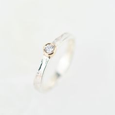 Tess, a beautiful gemstone Storybook ring set with a sparkling diamond. A simple, elegant design featuring a 3mm wide diamond. The textured silver band has a contemporary feel. Perfect as an engagement, commitment or eternity ring. The storybook band is textured with the signature Storybook finish, a leather like design reminiscent of well loved and worn books. The edges move up and down organically as the silver gentle flows around your finger. They make the perfect ring worn on their own, or s Cardboard Jewelry Boxes, Horses Pendant, Sparkling Diamond, Unique Diamonds, Diamond Set, Simple Elegant, Ring Engagement, Gold Texture, Wide Bands