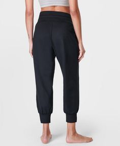 A new-and-improved version of our bestselling Gary Yoga Pants. Updated 85% recycled fabric is ultra-soft, smooth and sweat-wicking. Barrel leg silhouette and deep waistband for a comfortable, relaxed fit . Two side slip pockets. Model wears size S and is 178cm/5'10" tall. Style Code: SB9728Colour: Black Solid Ankle-length Athleisure Joggers, Casual 4-way Stretch Capris For Yoga, Athleisure Harem Pants For Loungewear With Relaxed Fit, Comfort Waistband Solid Yoga Pants, Stretch Ankle-length Yoga Pants For Sports, Functional Yoga Bottoms With Contoured Waistband, Yoga Pants With Compressive Comfort Waistband, 4-way Stretch Activewear With Pockets Ankle-length, Comfort Stretch Sweatpants With Elastic Waistband For Sportswear