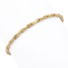 This gleaming Stefano Oro rope chain bracelet is inspired by the intricate designs of ancient Etruscan jewelry, known for its craftsmanship and detailed patterns. It beautifully features interwoven strands that create a textured and dynamic appearance, reminiscent of traditional rope designs. The alternating godronato (Italian for knurled) and polished finishes create a dynamic contrast, enhancing the chain's texture and visual appeal. Made in Italy, it's expertly crafted in rich 14K yellow gold Elegant 14k Gold Rope Chain Bracelet, Flexible Yellow Gold-plated Chain Bracelet, Flexible Yellow Gold Chain Bracelet, Elegant Gold Bracelet With Rope Chain, Elegant Rope Chain Link Bracelets, Elegant Bracelets With Link Rope Chain, Elegant Bracelets With Rope Chain Link, Elegant Bracelets With Rope Chain And Link Shape, Classic Gold Bracelets With Rope Chain