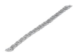 The bracelet with alternating lines of prong set round diamonds and channel set baguette diamonds, in platinum with an invisible clasp. Engraved 3797. Barber Pole, Jewellery Marketing, Baguette Diamonds, Art Deco Diamond, Channel Set, Baguette Diamond, Prong Setting, Diamond Bracelet, Round Diamonds