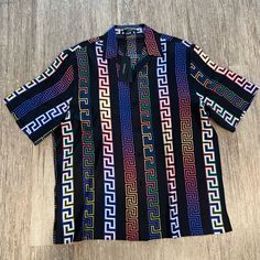 This Silk Piece Features Iconic Greca Designs Giving It A 90’s Nostalgic Vibe. Size 41 Eu Xl Us Designer Multicolor Printed Tops, Designer Multicolor Print Summer Tops, Designer Multicolor Print Tops For Summer, Designer Multicolor Graphic Print Tops, Designer Short Sleeve Multicolor Shirt, Designer Multicolor Summer Shirt, Purple Collared Top With Graphic Print, Designer Multicolor Collared Tops, Designer Black Shirt With Graphic Print