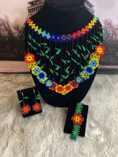 All our pieces are genuine and each chaquira is handcrafted by artisans from the most representative areas of huichol art.we only have one piece of each style, choose the option or style you like and only choose 1 quantity, thank you. Handmade Bohemian Jewelry Sets For Gift, Bohemian Jewelry Sets With Adjustable Round Beads, Artisan Adjustable Colorful Beaded Jewelry, Artisan Jewelry With Colorful Adjustable Beads, Hand-strung Beads As Gift, Hand-strung Multicolor Beads For Gifts, Unique Adjustable Jewelry Sets As Gifts, Beaded Earrings With Round Beads For Gifts, Adjustable Hand-strung Beaded Earrings As Gift